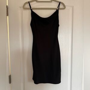 Urban outfitters black mini slip dress. Never worn without tags! Size XS